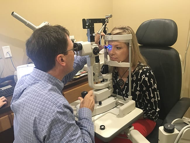 Female receiving eye exam.